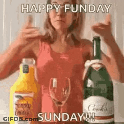 Woman Standing Near Orange Juice And Wine GIF
