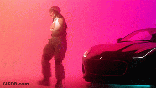Woman Standing Next To Car Pink Background GIF