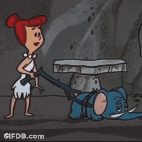 Woman Standing Next To Elephant With Letter E GIF