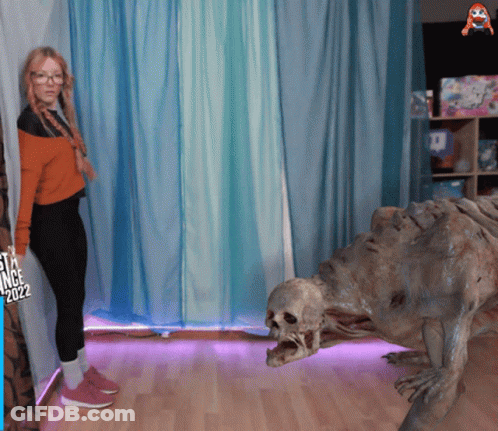 Woman Standing Next To Monster 2022 GIF