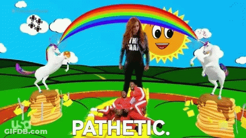 Woman Standing Next To Pancake Stack With Unicorns And Rainbow GIF