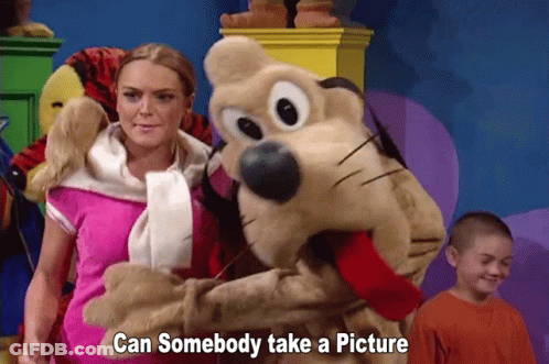 Woman Standing Next To Stuffed Animal Can Somebody Take A Picture GIF