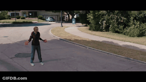 Woman Standing On Road With Arms Outstretched GIF