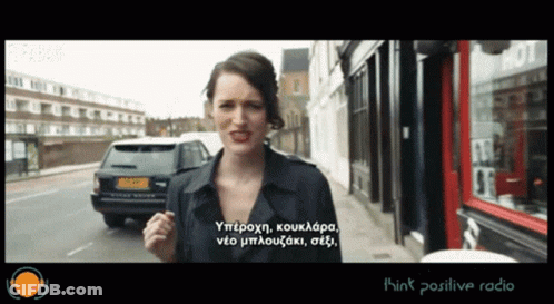 Woman Standing On Street With Think Positive Radio GIF