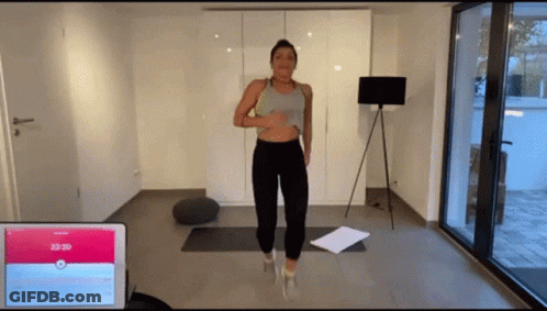 Woman Standing On Yoga Mat GIF