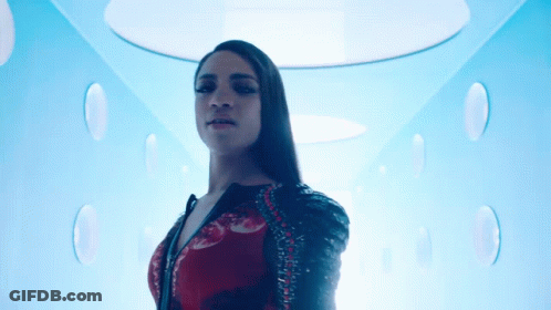 Woman Standing Under Blue Ceiling GIF