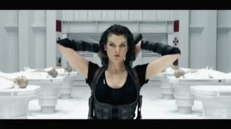Woman Standing With Arms Outstretched And Cross On Chest GIF