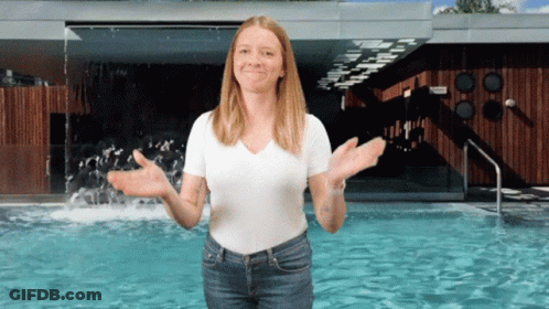 Woman Standing With Arms Outstretched GIF