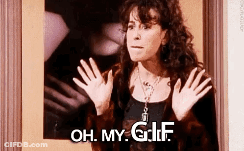 Woman Standing With Hands Up Saying Oh My GIF