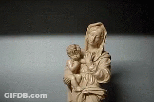 Woman Statue Holding Baby GIF