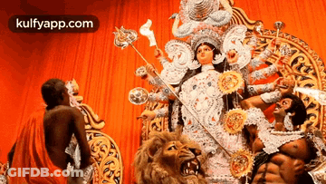 Woman Statue Holding Torch With Lion And Man GIF