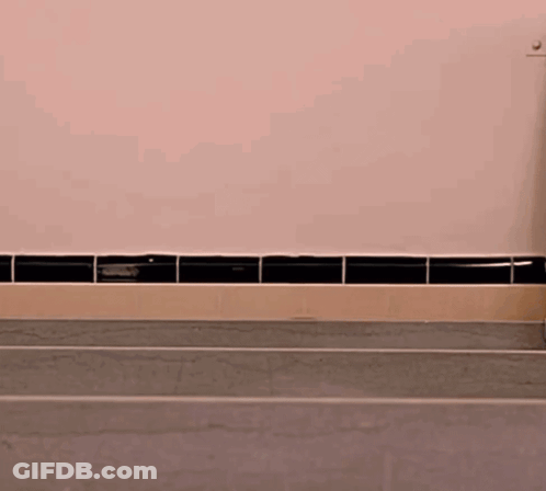 Woman Sticking Head Out Of Sink Surprised GIF
