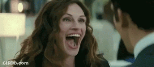 Woman Sticking Tongue Out At Man GIF