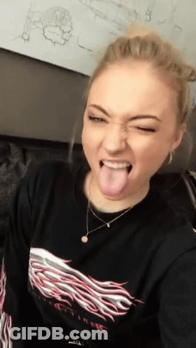 Woman Sticking Tongue Out At Whiteboard Hand Drawing GIF