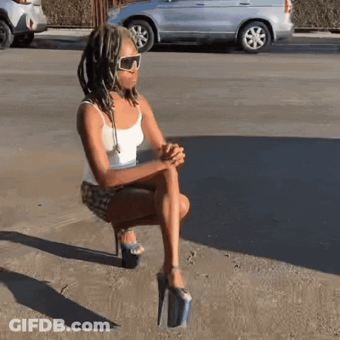 Woman Sticking Tongue Out Dancing In Crowd GIF