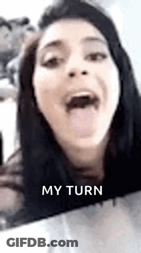 Woman Sticking Tongue Out On Cell Phone GIF