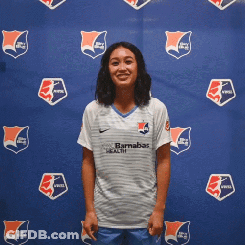 Woman Sticking Tongue Out While Doing Hook Em Sign GIF