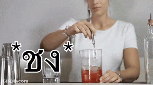 Woman Stirring Drink In Glass GIF