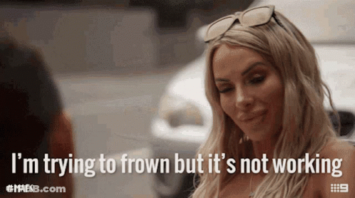 Woman Sunglasses Trying To Frown But Not Working GIF