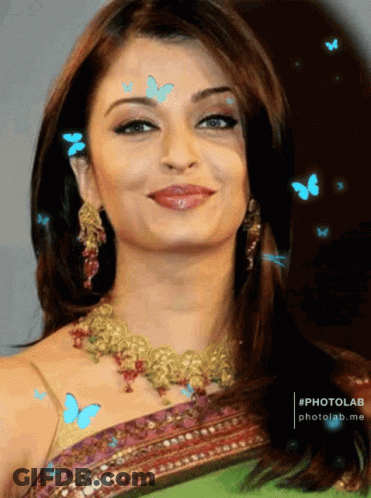 Woman Surrounded By Blue Butterflies GIF