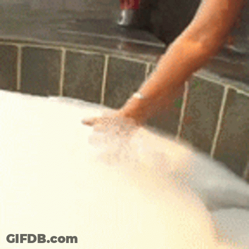 Woman Taking Bath In Bubbles GIF