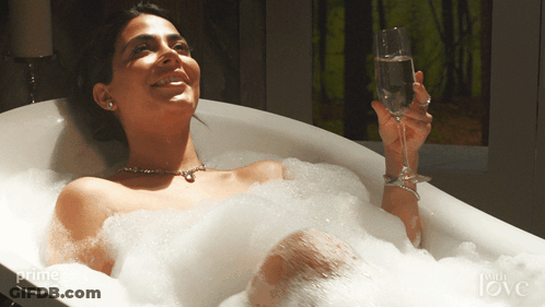 Woman Taking Bath With Champagne GIF