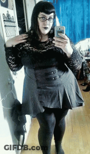 Woman Taking Mirror Selfie GIF