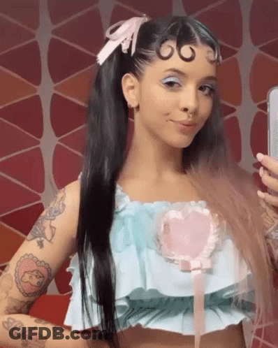 Woman Taking Mirror Selfie Blue Top Pink Heart GIF