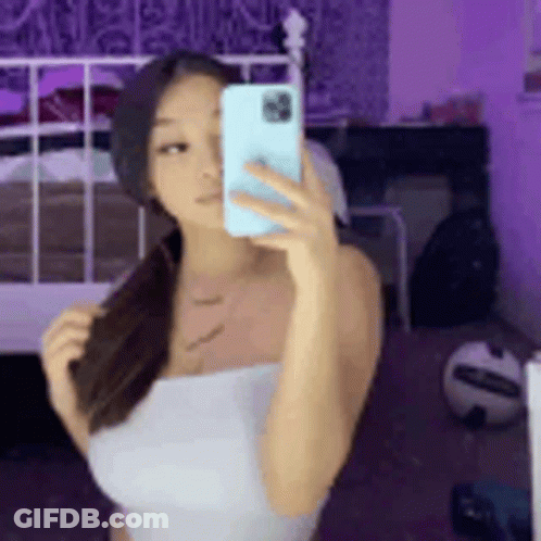 Woman Taking Mirror Selfie GIF