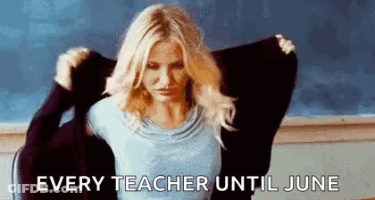 Woman Taking Off Sweater In Classroom GIF