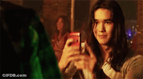 Woman Taking Photo Of Woman GIF