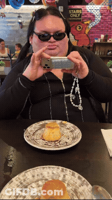 Woman Taking Picture Of Food With Stairs Only Sign GIF