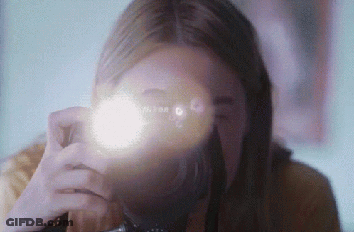 Woman Taking Picture With Nikon Camera GIF