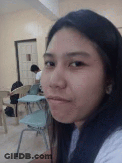 Woman Taking Selfie In Classroom GIF