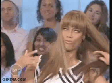Woman Taking Selfie In Front Of Crowd GIF