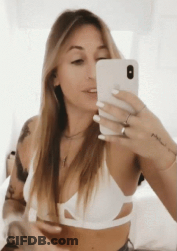 Woman Taking Selfie In Mirror GIF