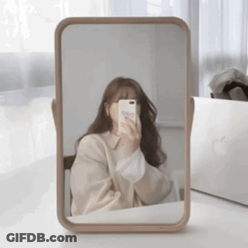 Woman Taking Selfie In Mirror GIF