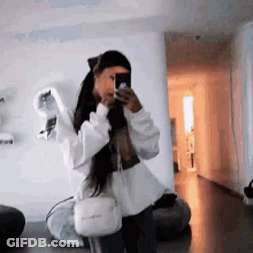 Woman Taking Selfie In Mirror GIF