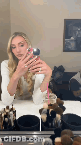 Woman Taking Selfie In Mirror GIF