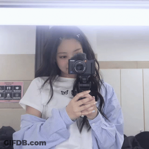 Woman Taking Selfie In Mirror GIF