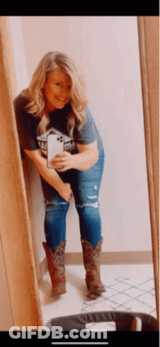 Woman Taking Selfie In Mirror GIF