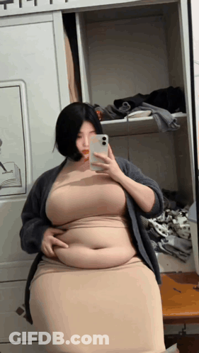 Woman Taking Selfie In Mirror GIF