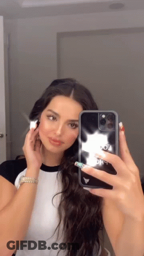 Woman Taking Selfie In Mirror With Phone Case GIF