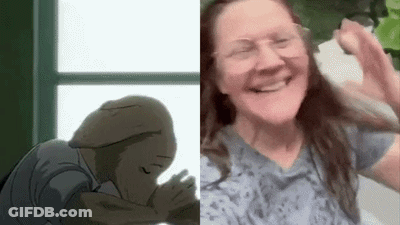 Woman Taking Selfie Next To Drawing Of Man And Woman GIF