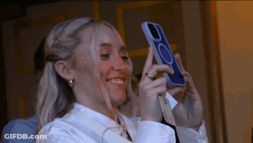 Woman Taking Selfie With Cell Phone GIF