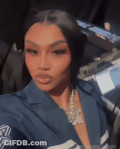 Woman Taking Selfie With I Love You Necklace GIF