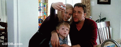 Woman Taking Selfie With Man And Child GIF