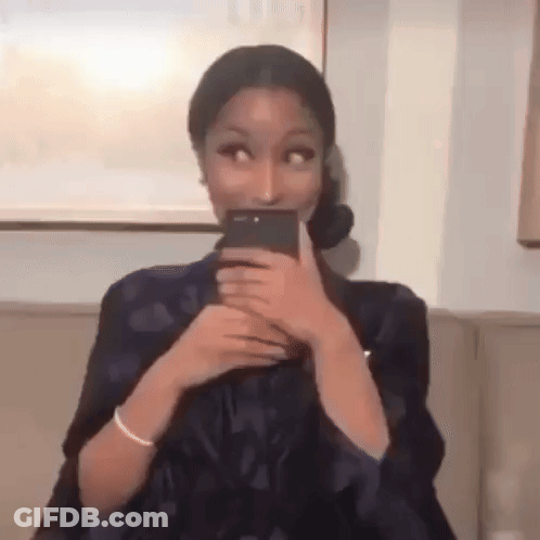 Woman Taking Selfie With Phone On Couch GIF