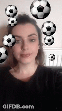 Woman Taking Selfie With Soccer Balls GIF