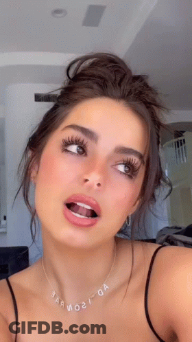 Woman Taking Selfie With Tongue Out GIF
